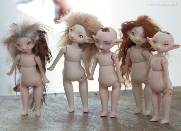 a group of little fairy dolls