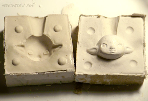 a picture showing the plaster mold for the dolls head right after it was made