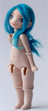 Bisque doll with electric blue hair.